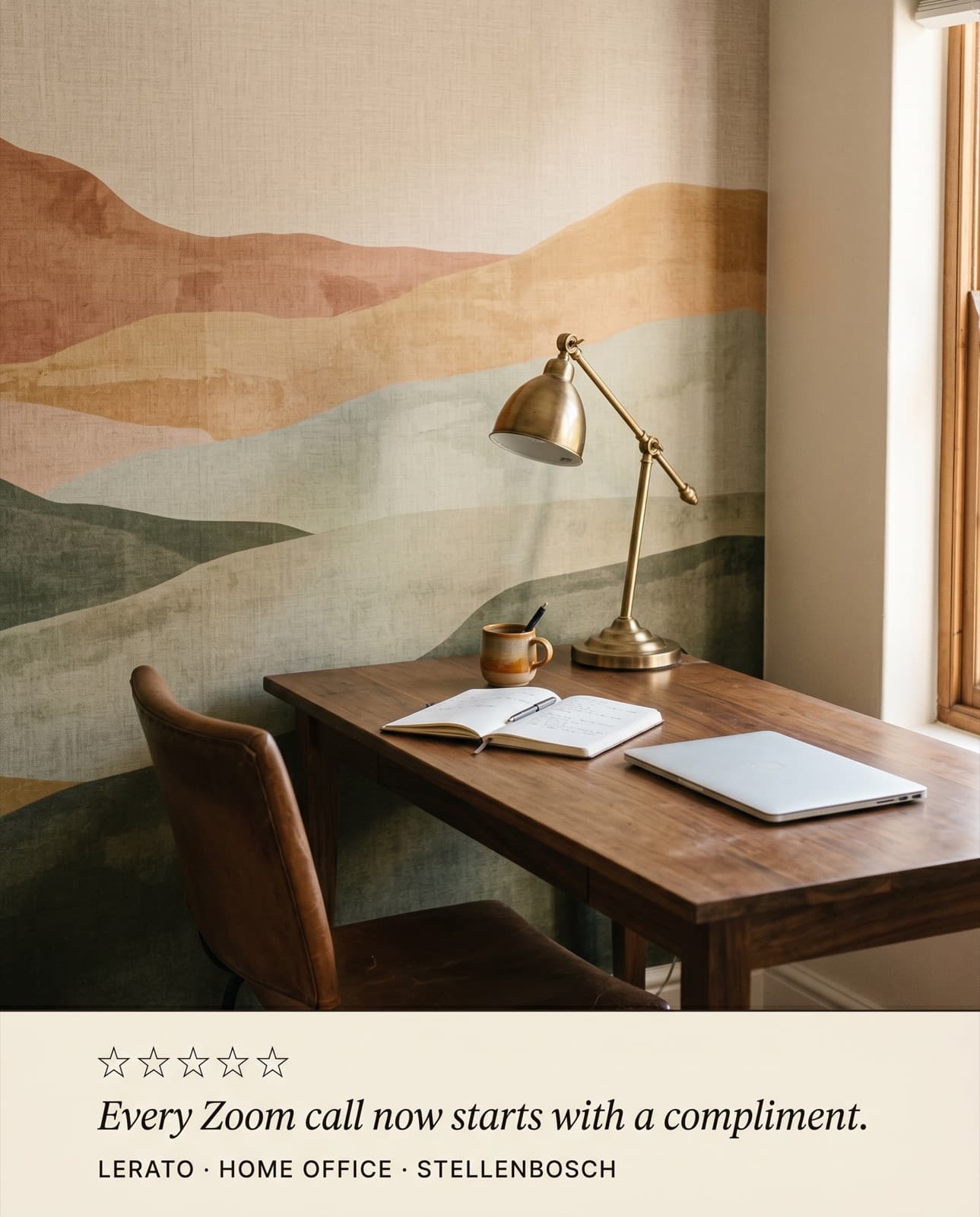 Home office with abstract landscape mural, walnut desk, brass lamp