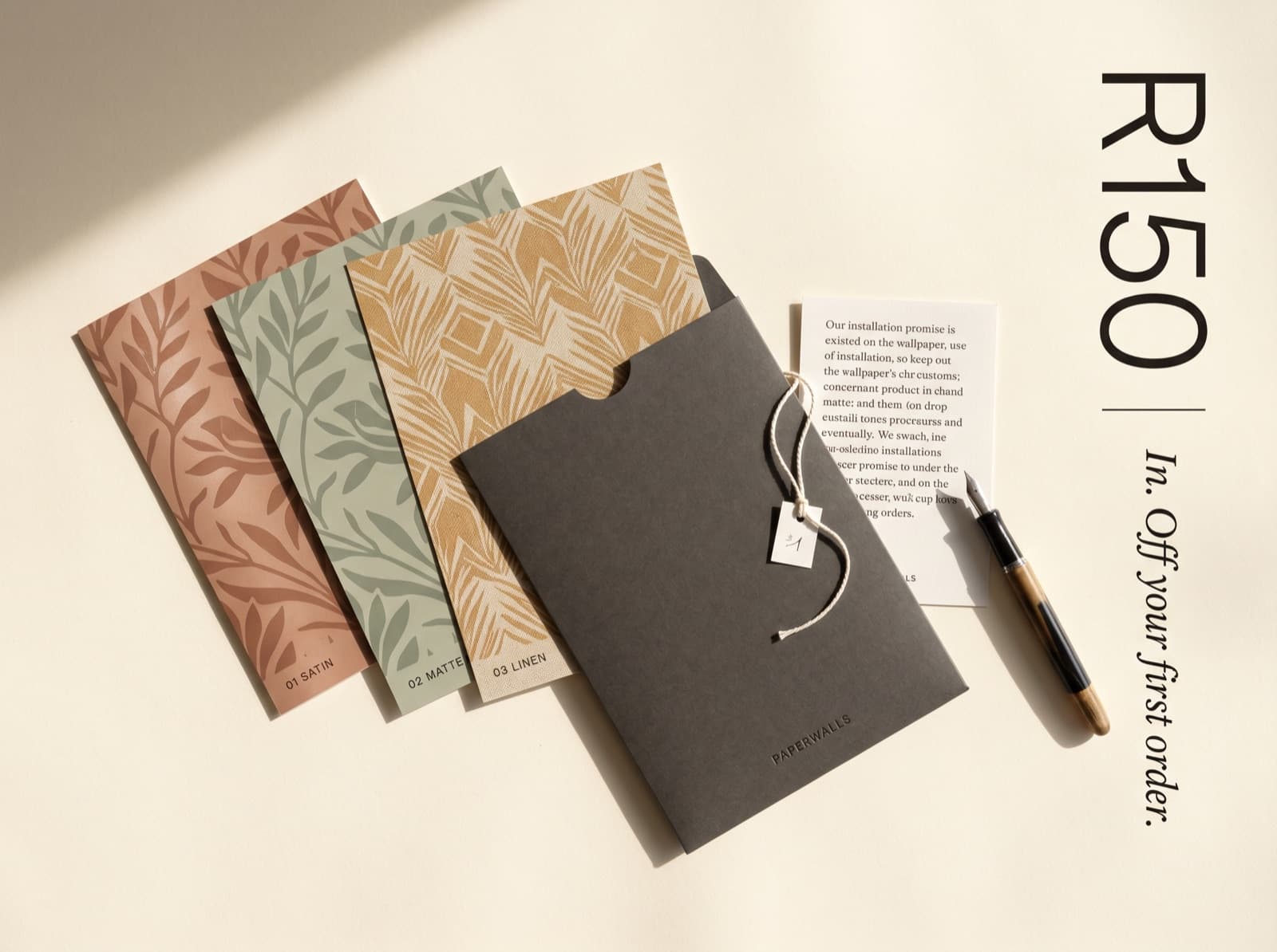 PaperWalls sample pack flat-lay with three finish swatches and kraft envelope